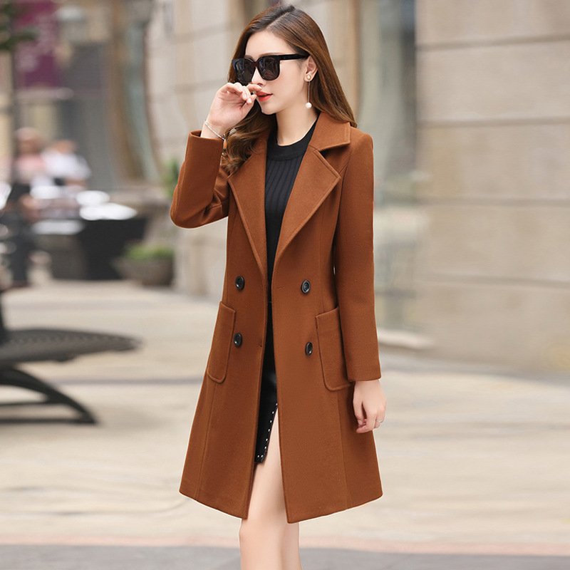 2722959129152.jpg The vintage windbreaker pulls in the knee-length tweed coat